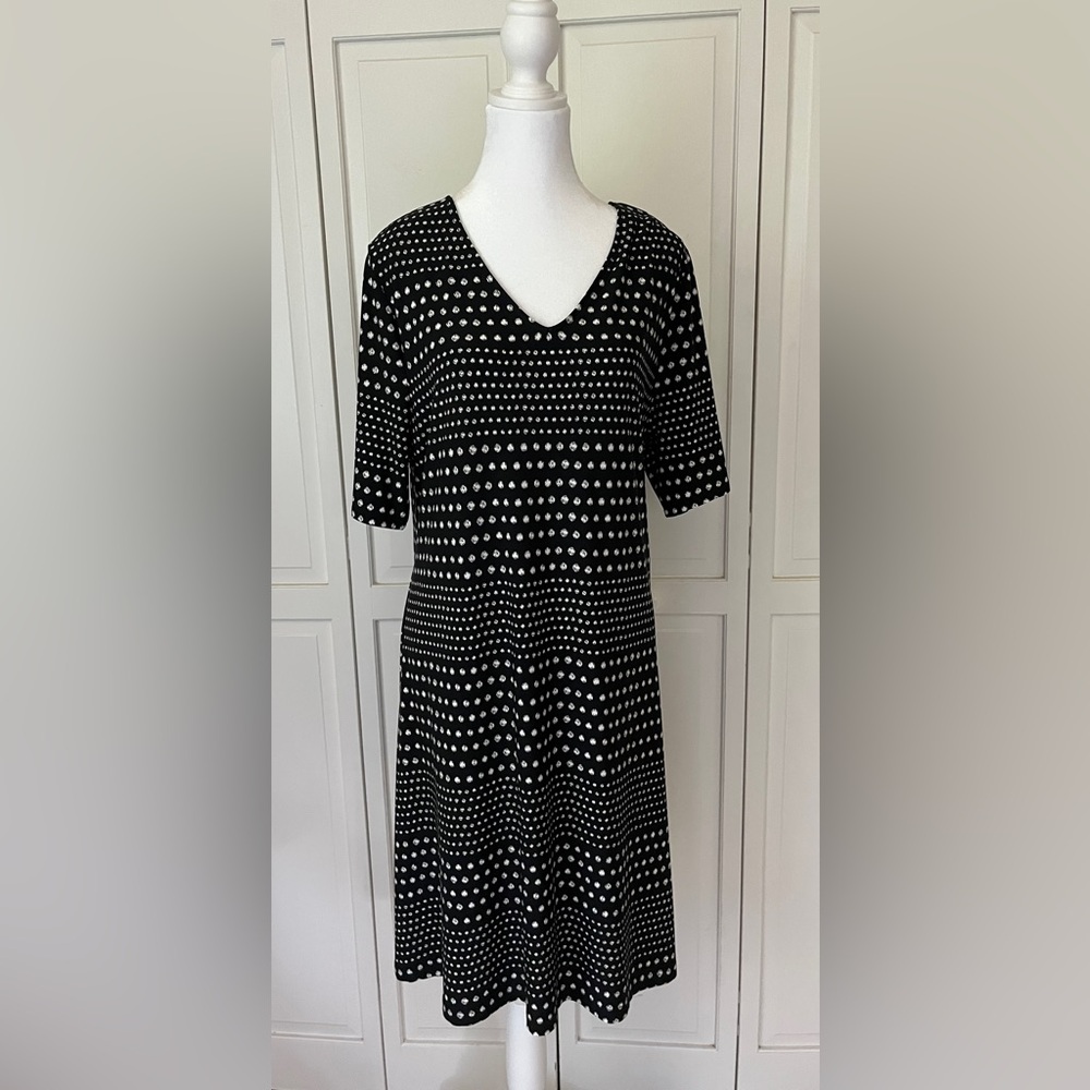 Chicos, almost new summer dress with elbow length sleeves, hits the knees.